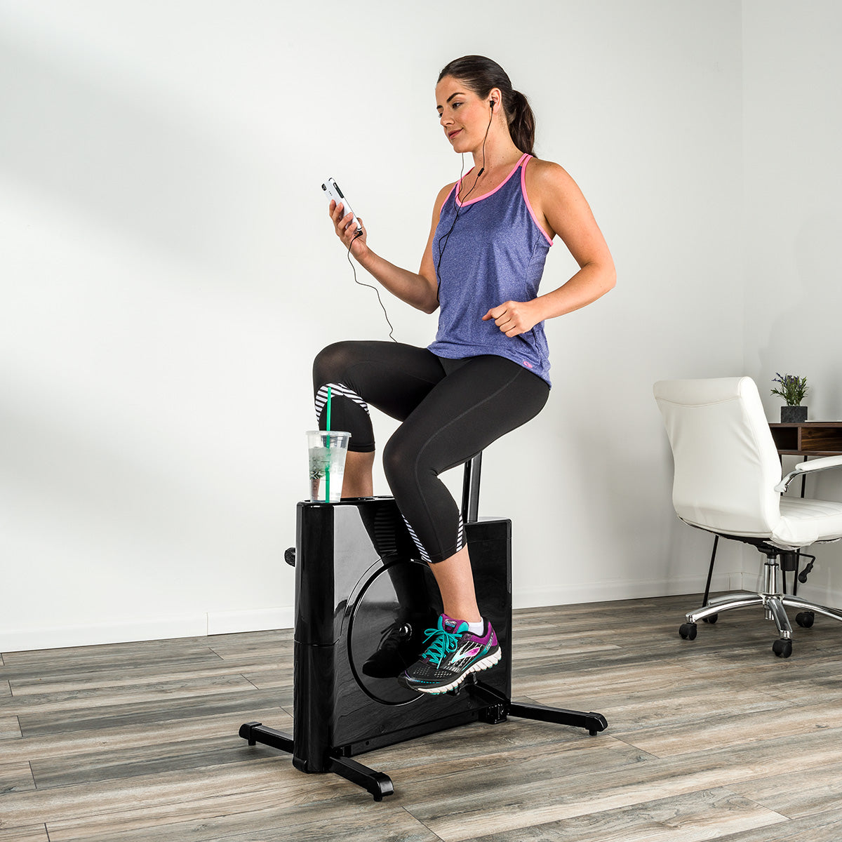 a stationary bicycle is raised off the ground Stationary Bike | Most Space-Saving Exercise Bike