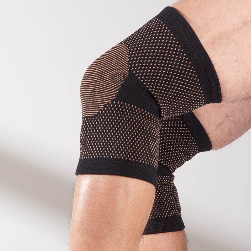 Copper Infused Compression Knee Braces by Specialty Retailer (Set of 2) - L