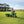 John Deere 3-Wheeled Pedal Tractor With Trailer