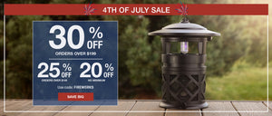 Promotional banner for a 4th of July sale with a lantern on a wooden surface.